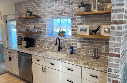 Monroe House | Cozy Cottage in Monroe. Newly remodeled with fun amenities including hot tub!