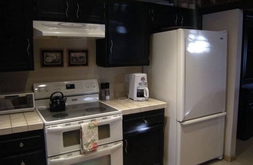 Elkhorn Village House | Cozy Family sized Condo w/access to Pool, Hot Tubs, Sauna, Golfing & Tennis!