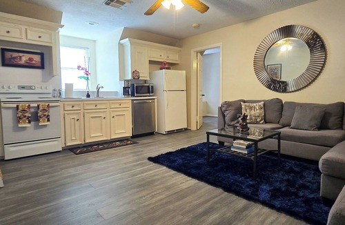 Memorial Northwest Apartment | Cozy French Getaway! With full kitchen, workspace, treadmill and grill.
