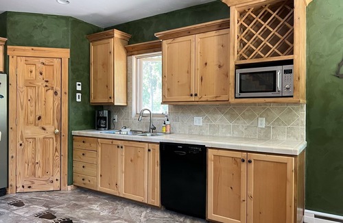 Alpine Northeast House | Cozy mountain retreat with a hot tub; steps to national forest trails!