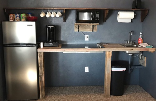 Butte Apartment | Cozy oasis nestled in mature aspen overlooking the city of Butte, Montana