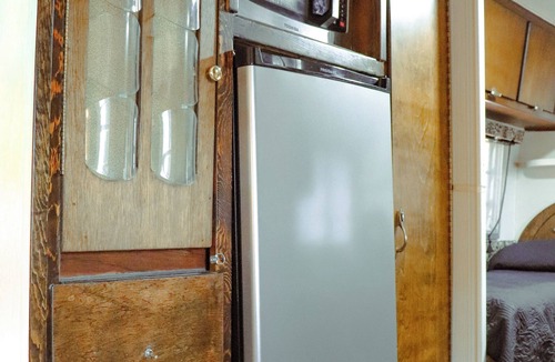 Poteau House | Cozy Vintage Airstream among the pines on World's Highest Hill. Pet-Friendly!