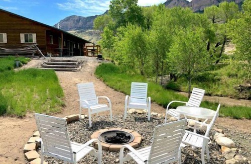 Cody Apartment | Creek Side Cabin #2- Wapiti Valley, steps from Trout Creek
