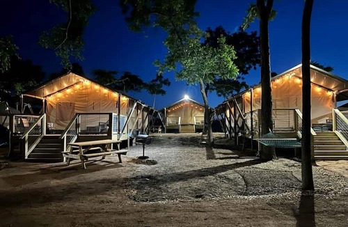 Fentress RV Rental | Creekside Texas Safari Tent Glamping for Nature Enthusiasts
