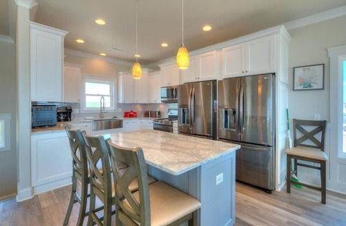 Yaupon Beach House | Current Sea: Oceanfront 7BR house in Oak Island, sleeps 16, ideal for family fun!