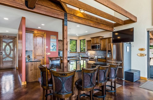 Laclede House | Custom riverfront home with private dock, game room, hot tub & heated floors