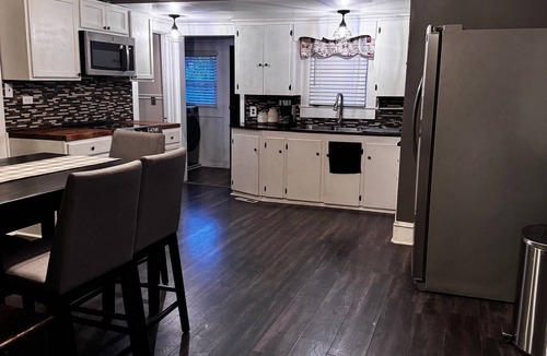 Kannapolis House | Cute home with fenced backyard, firepit & swings. Near downtown. Pet-friendly!