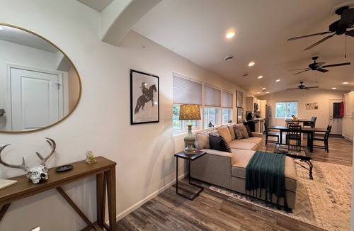 Sheridan Apartment | Discover our inviting 3-bdrm, 2-bathroom home, ideally situated near fairgrounds, hospital, VA, & downtown Sheridan. This newer-built residence offers all the comforts & conveniences you need for a pleasant stay, making it perfect for longer stays.