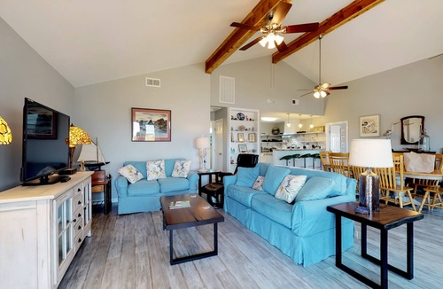 Bermuda Beach Cottage | Dog-friendly cottage with two primary suites, ocean views, beach access, & deck