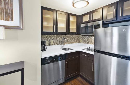 Mayfield Heights Condo | Equipped King Suite | 24-Hour Business Center, Fitness Center + Free Daily Breakfast