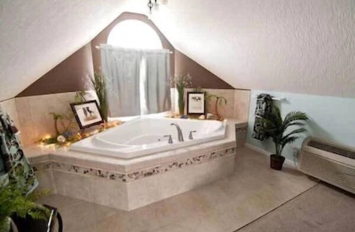 Dundee Cottage | Escape to our romantic stone cottage by a pond overlooking Amish country