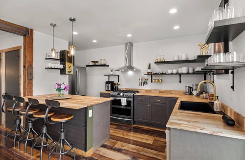 Kalispell House | Exclusive Guest Ranch with 13 bedrooms, Train Caboose and Hot Tub Lookout!