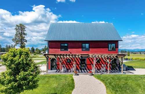 Kalispell House | Exclusive Guest Ranch with 13 bedrooms, Train Caboose and Hot Tub Lookout!