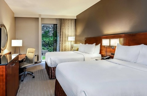 Executive Park Hotel | Experience Soothing Moments & Luxury! Pet-Friendly, Parking, Pool!