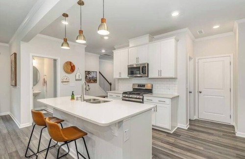 Garner House | Family Friendly with Sunroom & Game Room