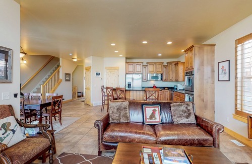 Bear Hollow Village House | Fantastic home with fireplace, private hot tub, central AC, and pool access