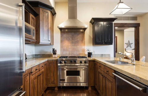 North Park City Condo | Festive Dates Open! Inviting Ski Condo with Golf Course Views and Grill!