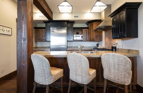 North Park City Condo | Festive Dates Open! Inviting Ski Condo with Golf Course Views and Grill!