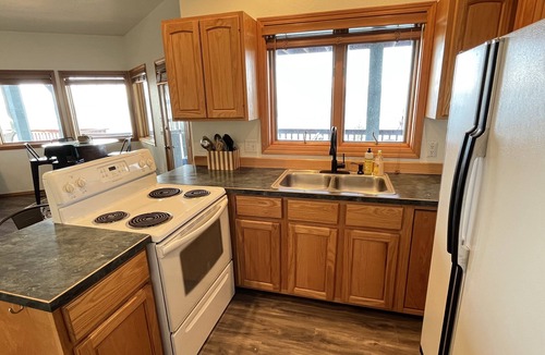 Bigfork House | Fill your soul w/400' of PRIVATE waterfront w/dock, lift, diving board & more!