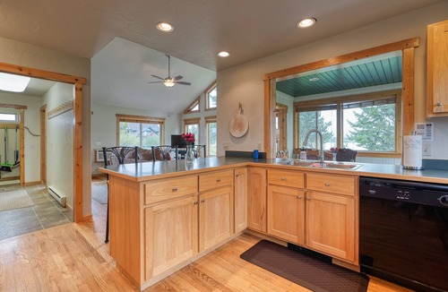 Kalispell House | Flathead River frontage, river access, firepit.