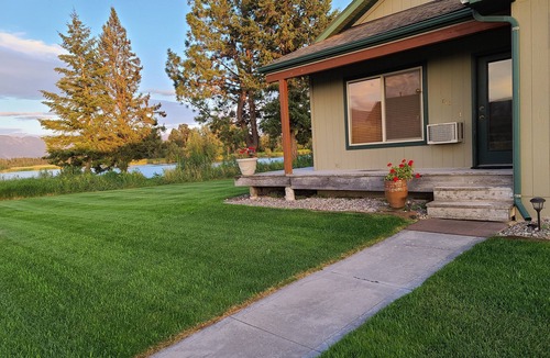 Kalispell House | Flathead River frontage, river access, firepit.