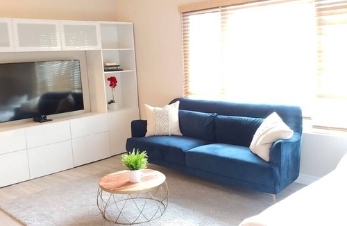 Lomita House | Front Room · Bright and Private Modern Room with City View!