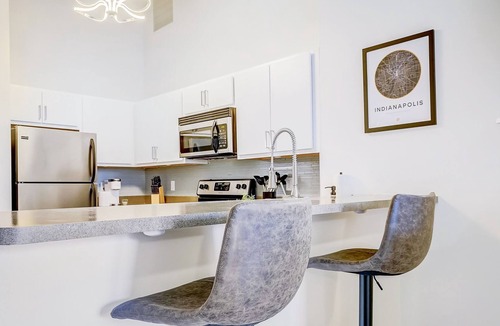 Mile Square Apartment | Frontdesk | 2 BR Apt by Kurt Vonnegut Museum