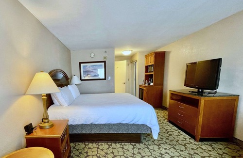 Chinatown Hotel | Fun and Relaxation Await in Chic Houston Room with Pool Near Memorial City Mall
