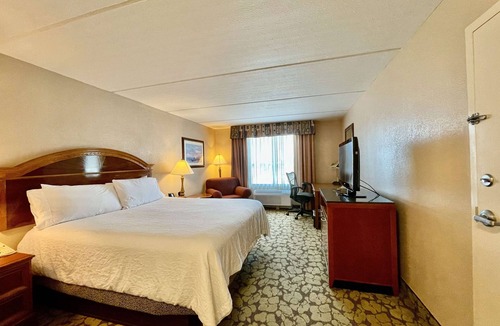 Chinatown Hotel | Fun and Relaxation Await in Chic Houston Room with Pool Near Memorial City Mall