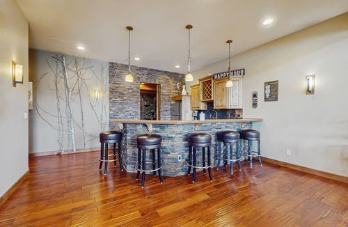 Hayden View Estates House | Grand lakeside home with private hot tub, sauna, game room & home theater