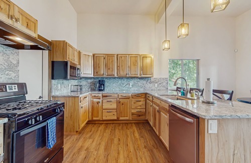 Hayden View Estates House | Grand lakeside home with private hot tub, sauna, game room & home theater