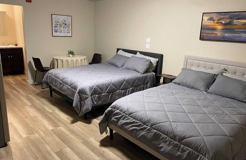 Green River Apartment | Green River Inn Suites with Kitchenettes & Self-Serve Laundry