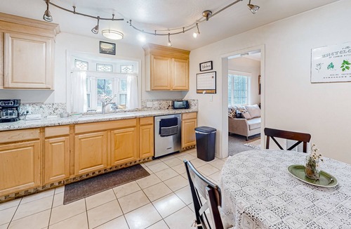 Burley House | Heartland historic home near local festivals with seasonal garden & mtn views