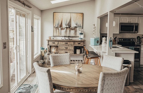 Portage Lakes Cottage | HEAVENLY Portage Lakes water front 4-bedroom cottage with HOTTUB, dog friendly!