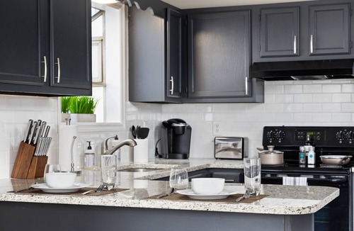 Five Points South Condo | Hilltop Getaway- Groups/6 units/King Beds/Parking