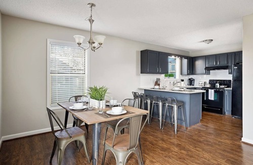 Five Points South Condo | Hilltop Getaway- Groups/6 units/King Beds/Parking