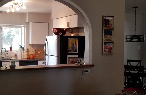 Nob Hill House | Historic Nob Hill home with cozy covered deck and close to Route 66.