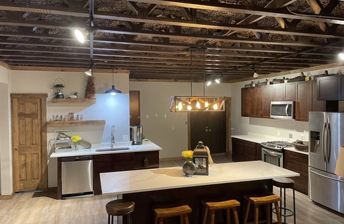 Patterson Cabin | HUGE 11 BD 6 BA CABIN! BAR AND GOLF SIMULATOR INSIDE, OUTDOOR KITCHEN/PROJECTOR