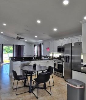 Orlando House | Huge Modern House near UCF - Full Kitchen, Board Games, Pets Allowed