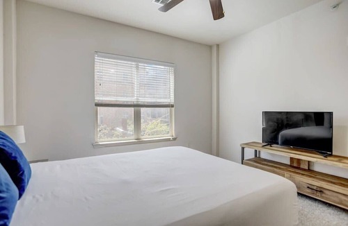West Campus Apartment | Huge West Campus Flat + In-Unit Theater + Hot Tub