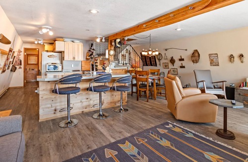Bayview House | Incredible lakefront floating home with mountain views, balcony, & gas fireplace