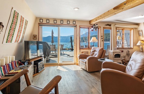 Bayview House | Incredible lakefront floating home with mountain views, balcony, & gas fireplace