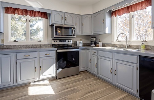 Jackson Hole House | Inviting home with mountain view, fireplace, golf nearby, & washer/dryer