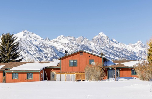 Jackson Hole House | Inviting home with mountain view, fireplace, golf nearby, & washer/dryer