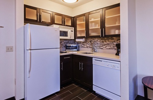 South Tulsa Apartment | King Suite in Tulsa | Free Breakfast + Fitness Center + Seasonal Outdoor Pool
