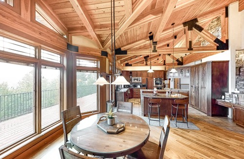 Kalispell House | Lake- & mountain-view home with decks, fireplaces, shuffleboard