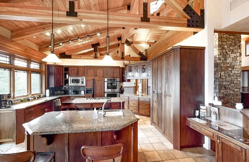 Kalispell House | Lake- & mountain-view home with decks, fireplaces, shuffleboard