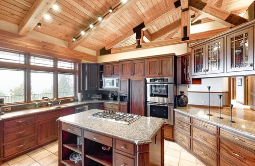 Kalispell House | Lake- & mountain-view home with decks, fireplaces, shuffleboard