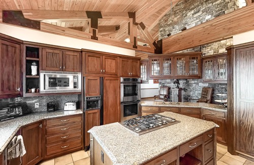 Kalispell House | Lake- & mountain-view home with decks, fireplaces, shuffleboard