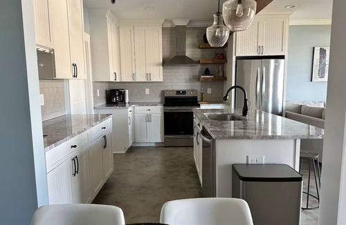 Southmont House | Lakefront 2 BR Cottage sleeps 6 with private dock, kayaks, and heated patio